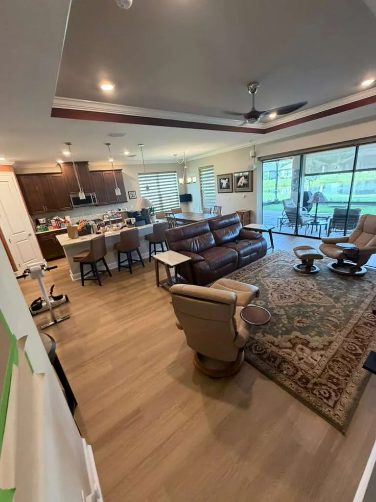 Living room after LVP flooring installation in Esplanade at Wiregrass Ranch, Wesley Chapel, FL