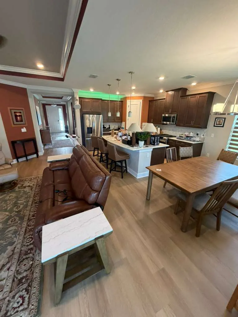 Dining room after LVP flooring installation in Esplanade at Wiregrass Ranch, Wesley Chapel, FL