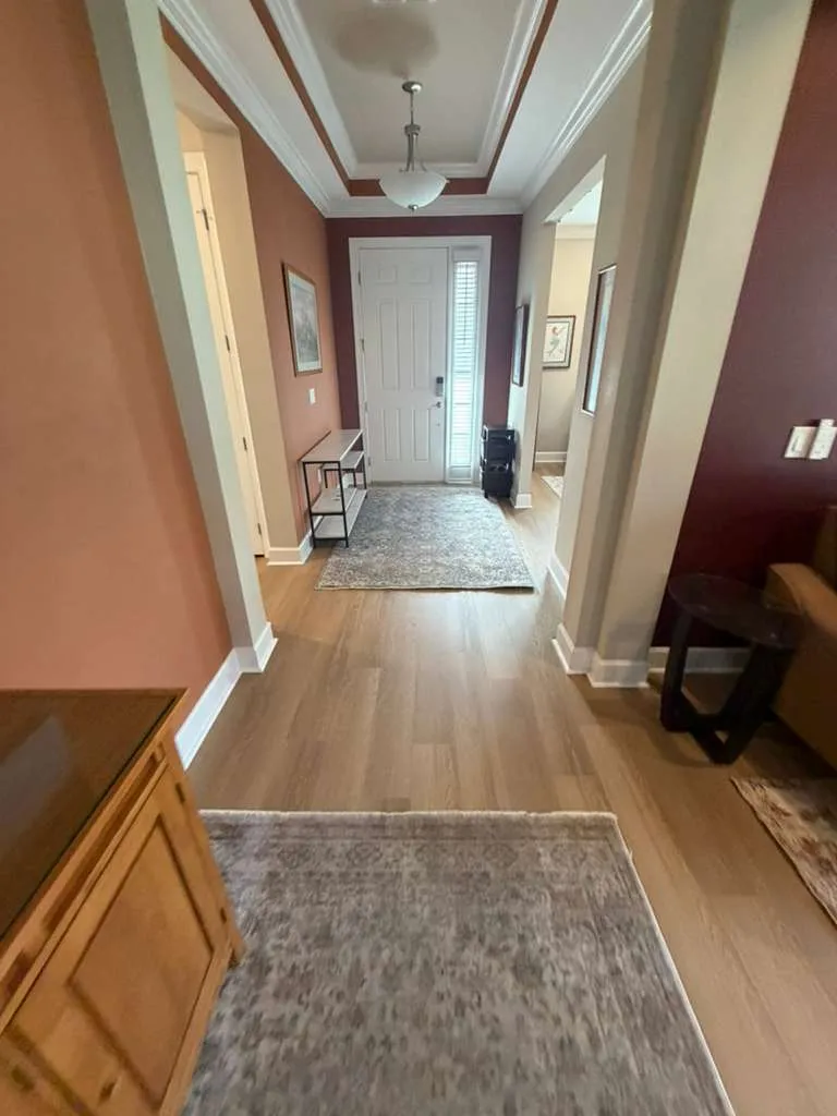 Hallway after LVP flooring installation in Esplanade at Wiregrass Ranch, Wesley Chapel, FL