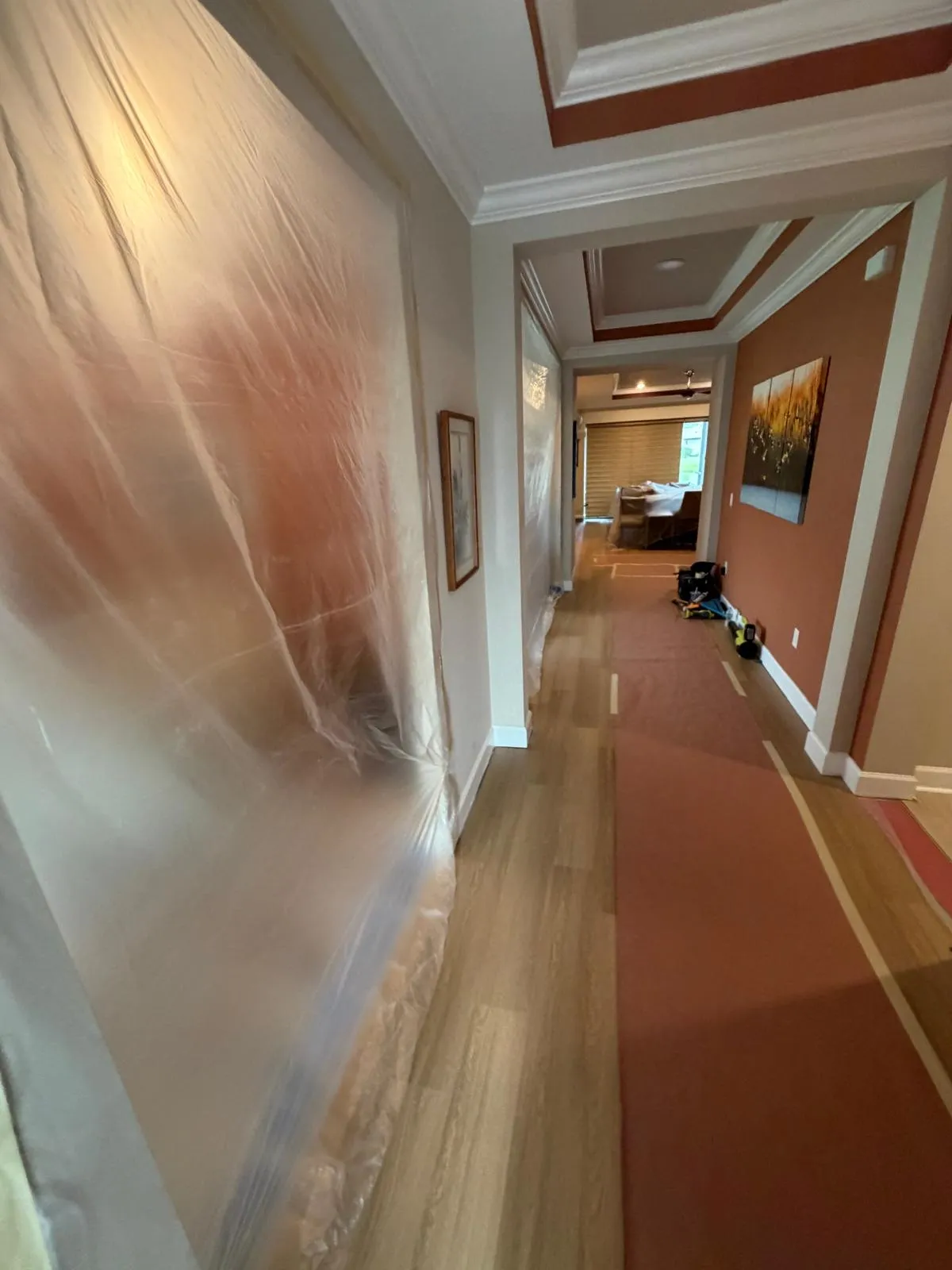 Hallway during LVP flooring installation in Esplanade at Wiregrass Ranch, Wesley Chapel, FL