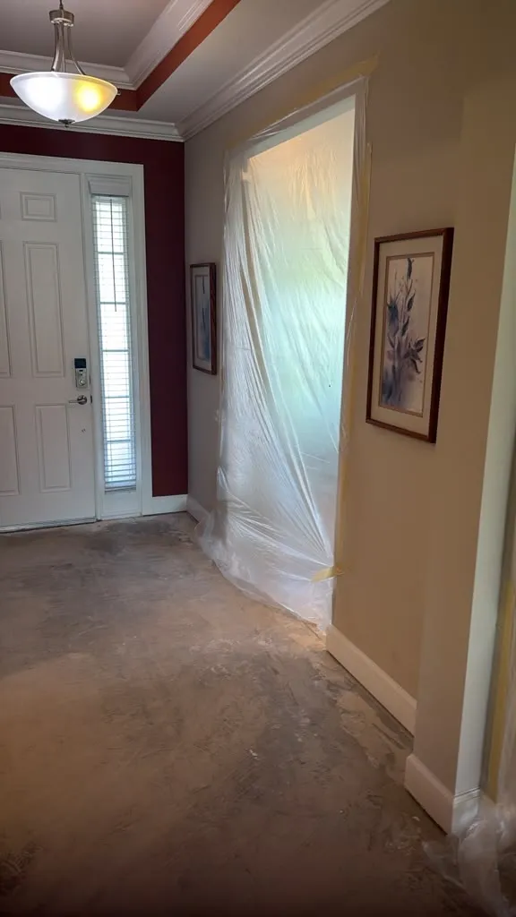 Non-working areas protected during LVP flooring installation in Esplanade at Wiregrass Ranch, Wesley Chapel, FL